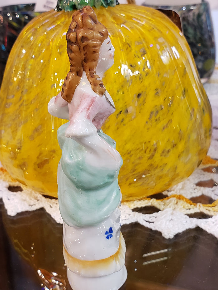 Buxom victorian lady figurine