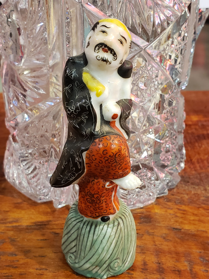 China dancing man porcelain figurine
