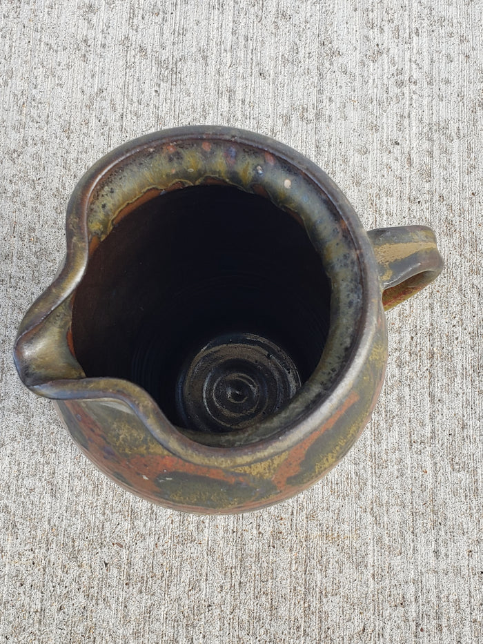 Green print glazed pottery pitcher