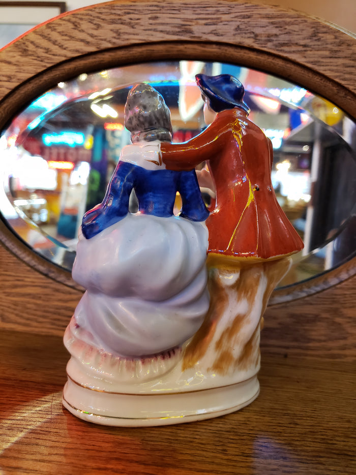 Porcelain figurine of Senior Victorian Man & Woman