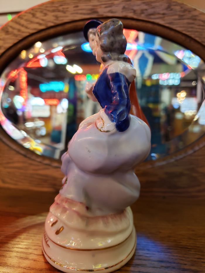 Porcelain figurine of Senior Victorian Man & Woman