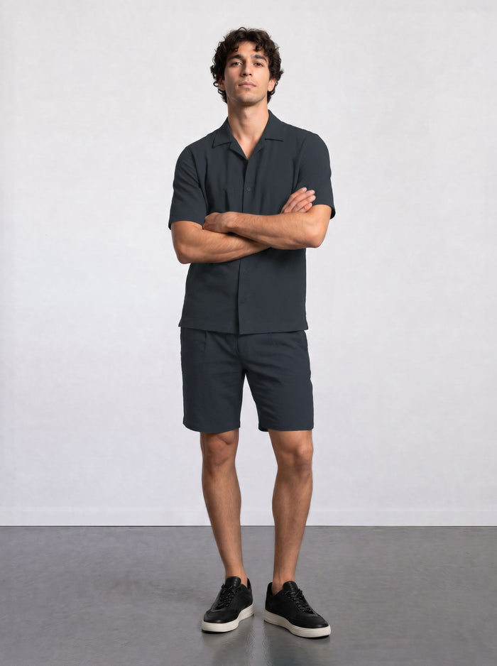 THE CITY PLEAT - TEXTURED SHORTS - NAVY BLUE
