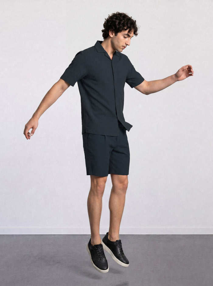 THE CITY PLEAT - TEXTURED SHORTS - NAVY BLUE