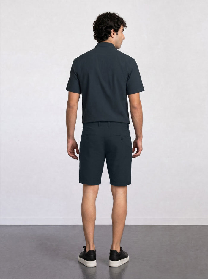 THE CITY PLEAT - TEXTURED SHORTS - NAVY BLUE